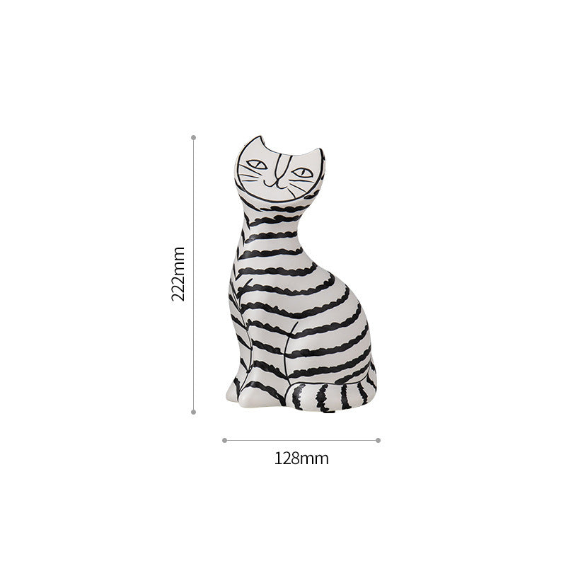 Ceramic black and white striped cat like decoration