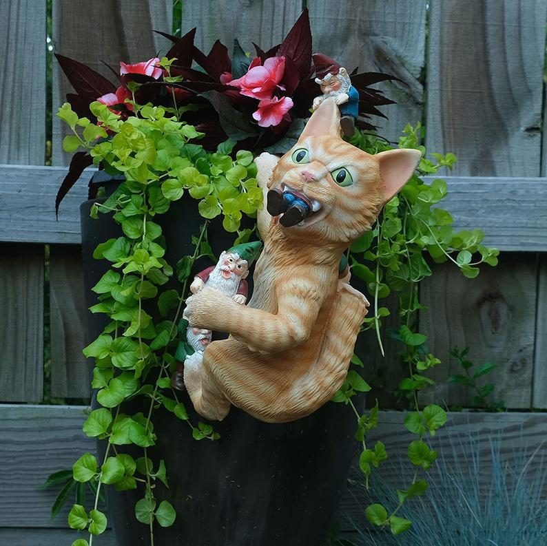 Hanging cat eating dwarf garden art deco ornaments